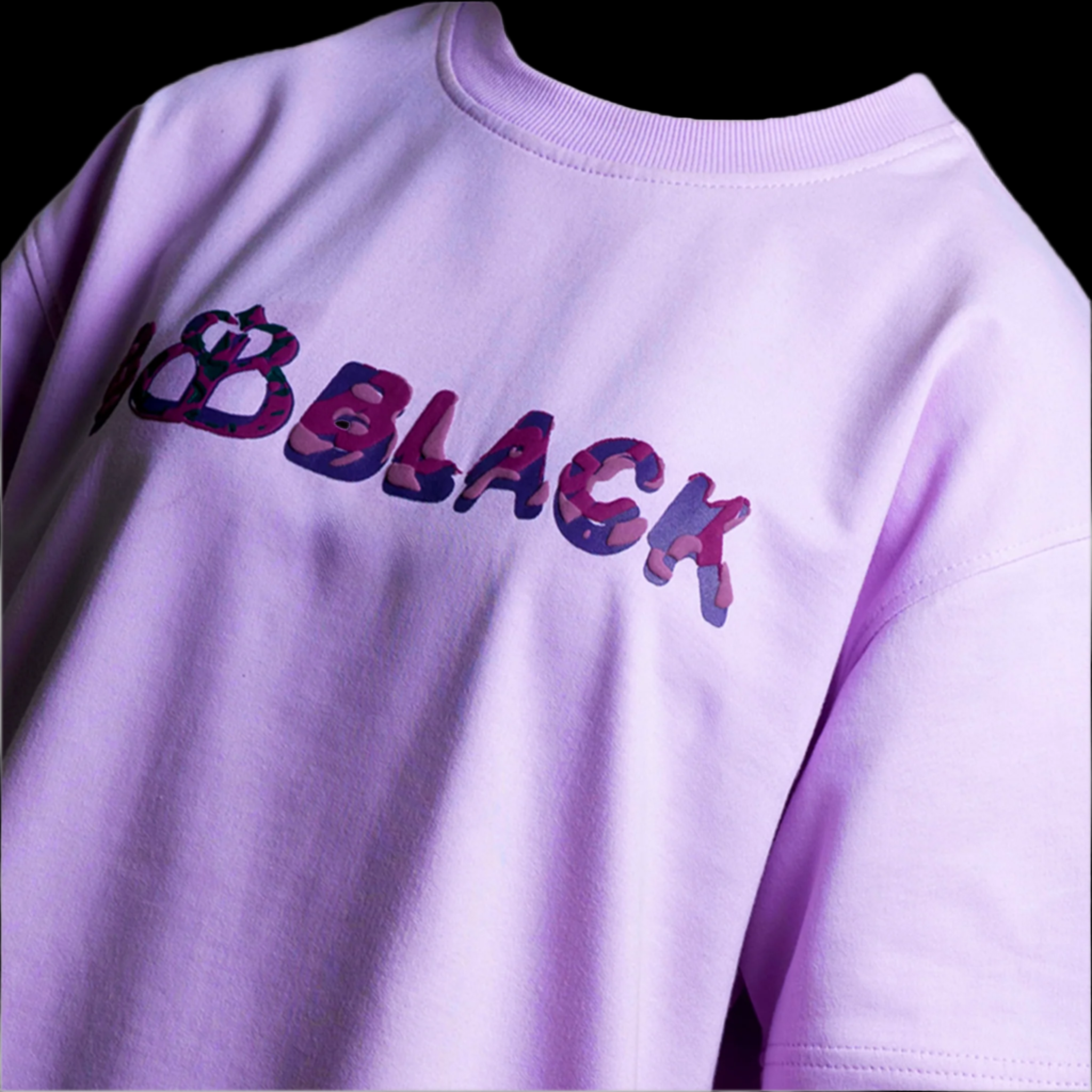 Purple sweatshirt with 'B FOR BLACK' text on the front